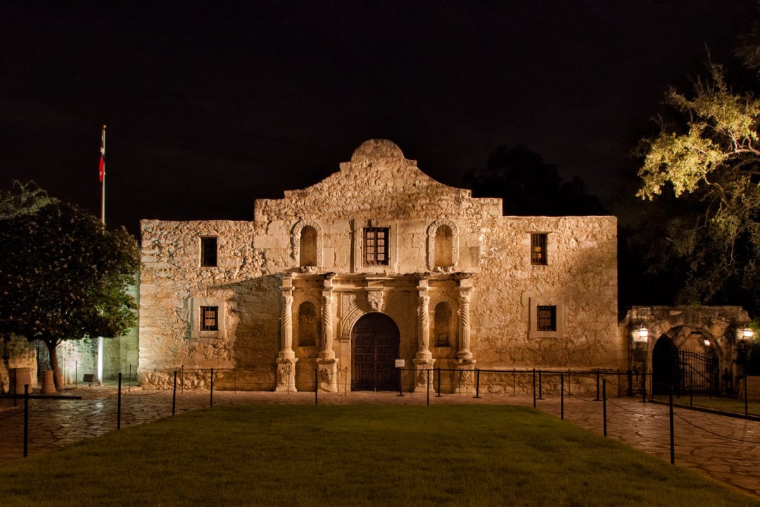 a night shot of the alamo