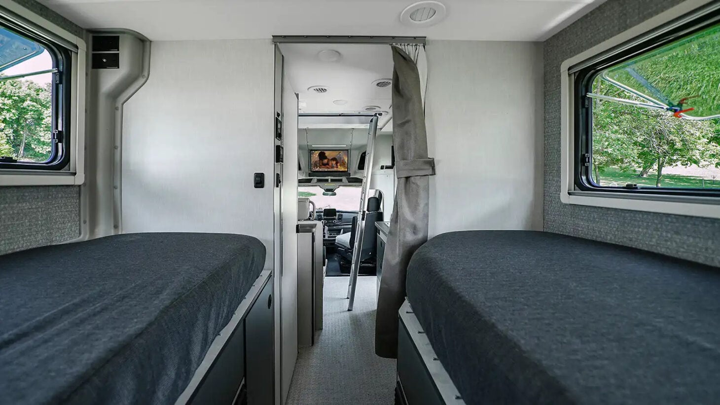 Two beds inside an RV bedroom