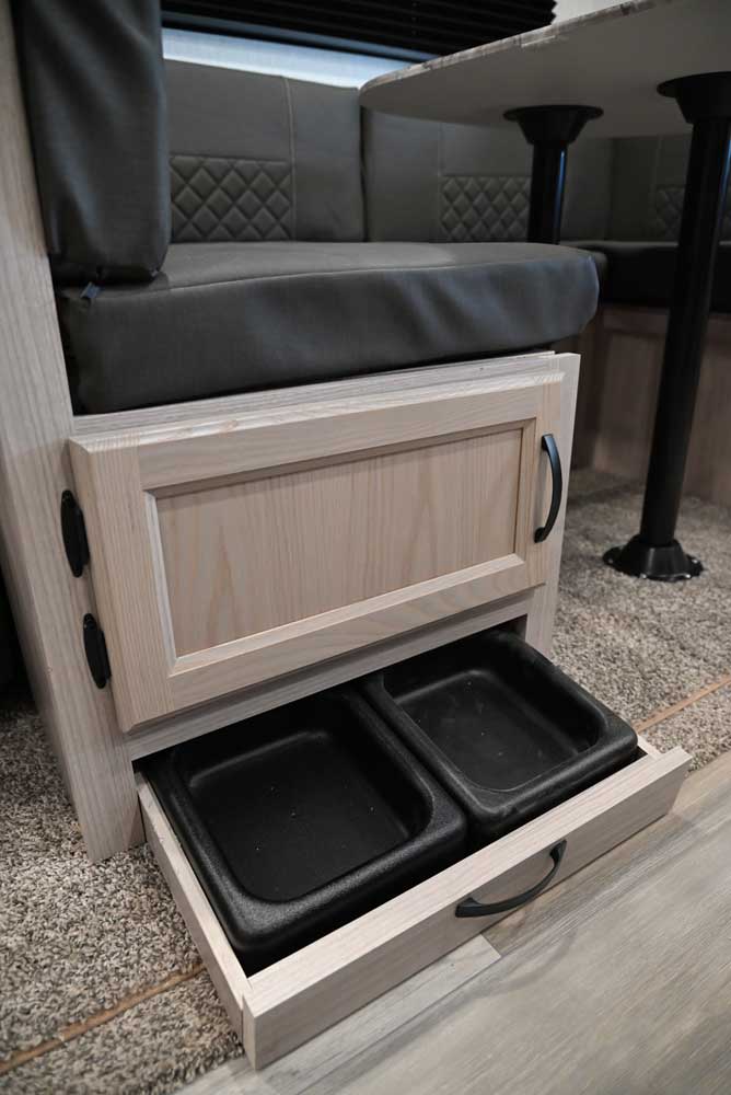 Kick-out pet dish inside a Coachmen Spirit 3272BH